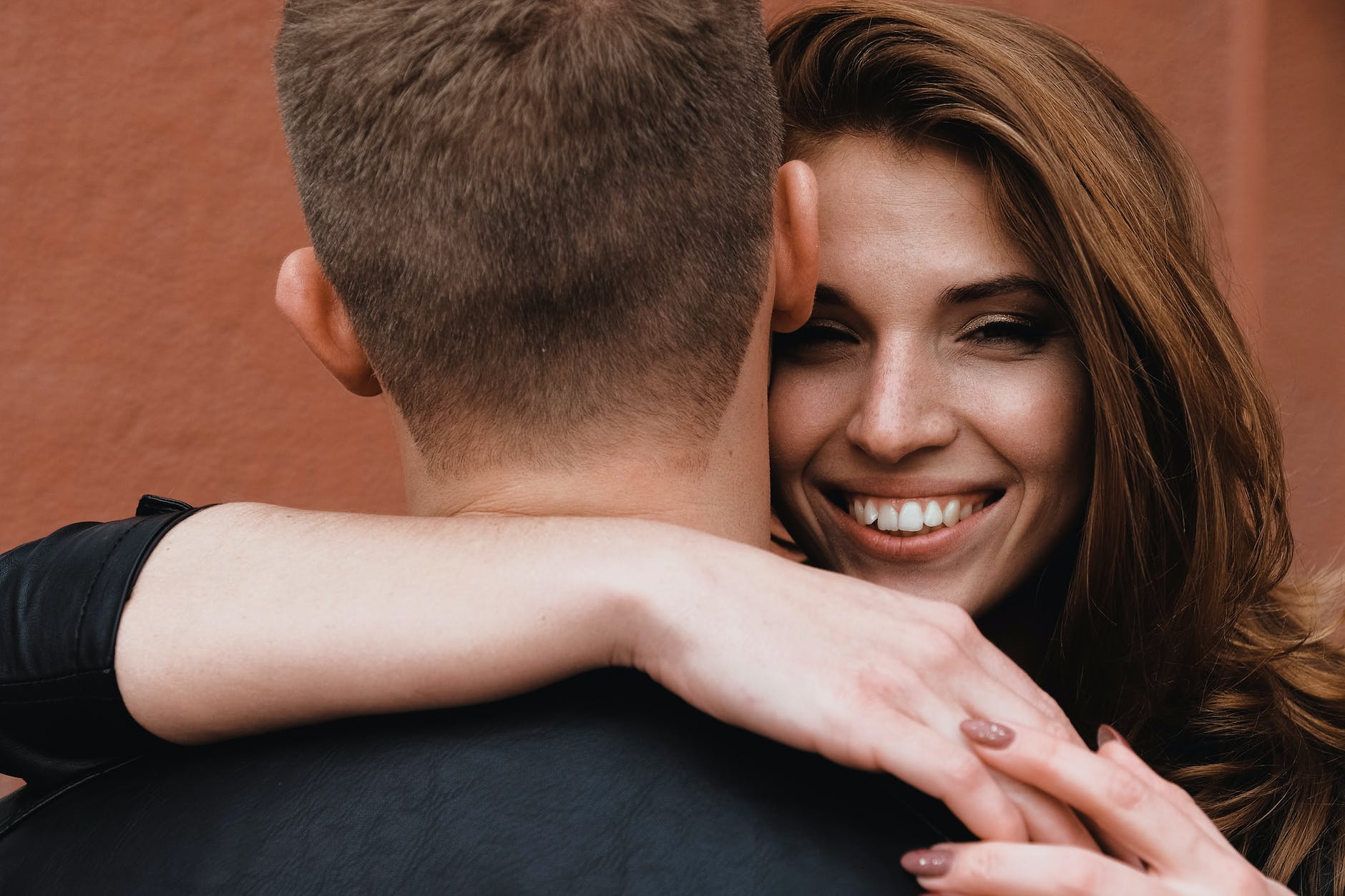 woman hugging man