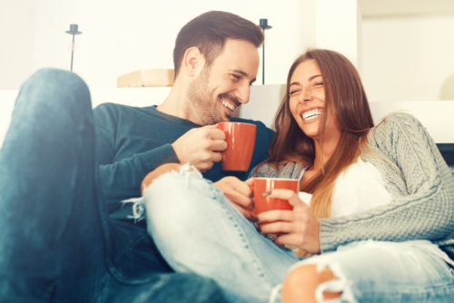 Happy young couple at home relationship - couple